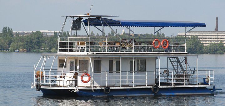 Walks along the Dnieper on the steamer Coral in the Dnieper. Book your deck seats at a discount.