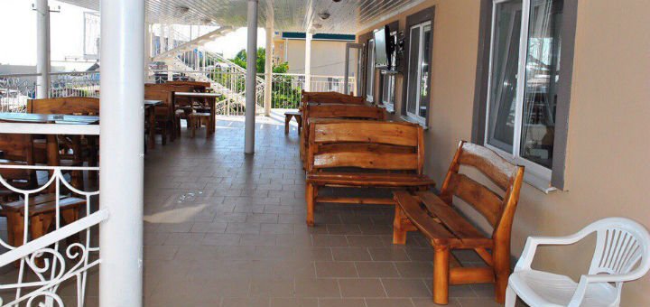 Summer terrace with TV in the hotel "Iceberg" in the Iron Port. Book trips to the Black Sea at a discount.
