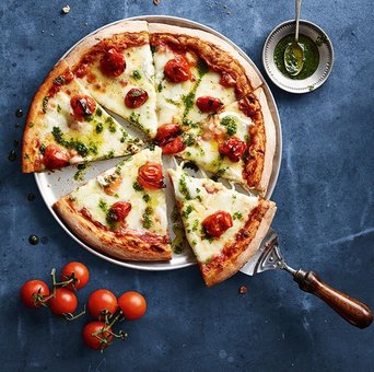 Pizza at home "Home Pizzeria" in Kiev. Order food delivery at a discount.